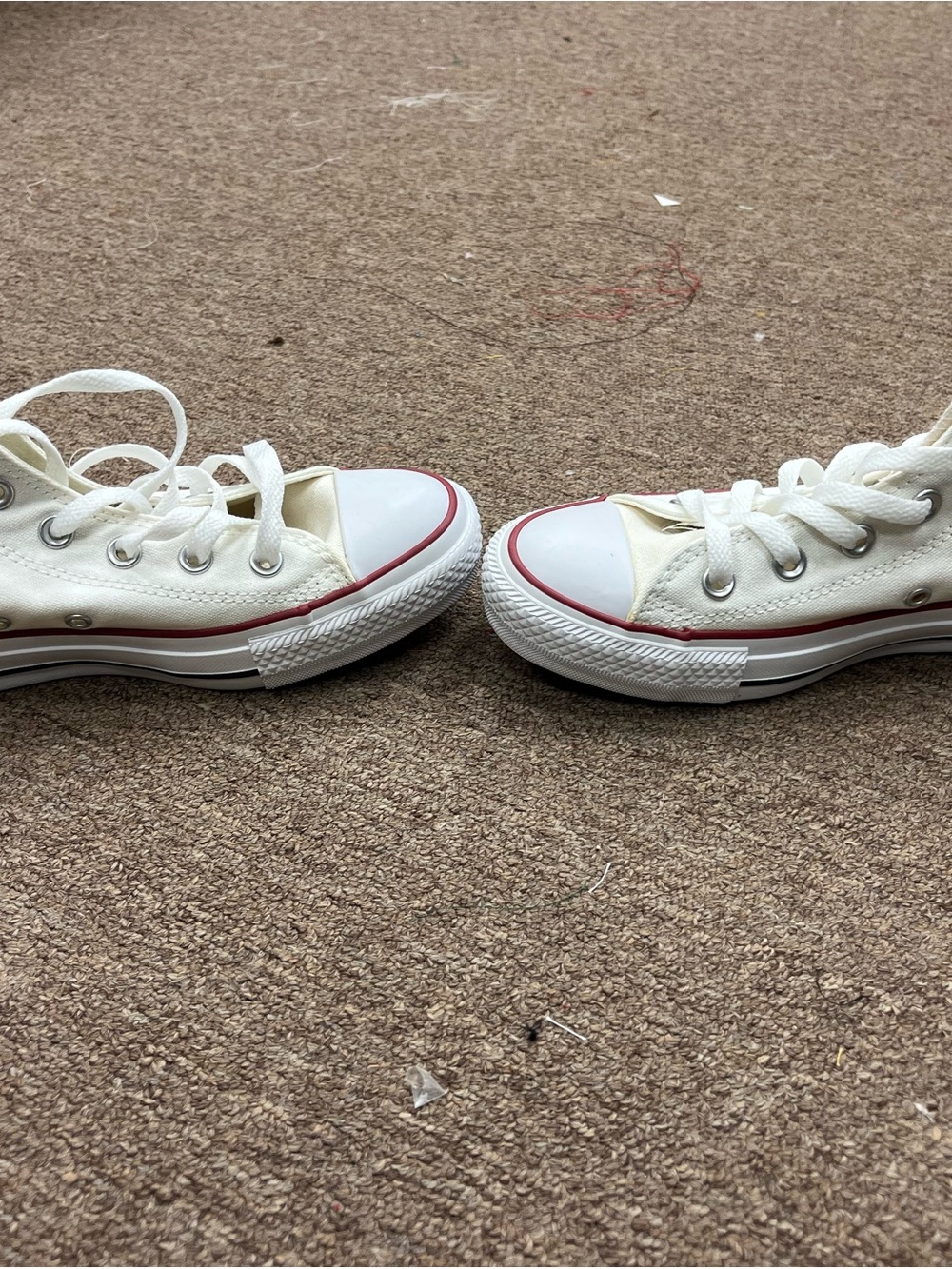 Classic women’s white Converse sneakers